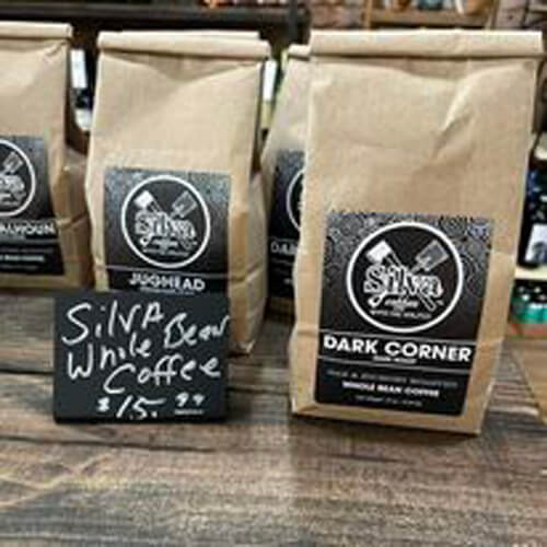 Bags of Silva Whole Bean Coffee on a shelf