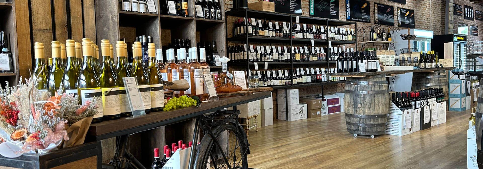 A wide angle photo displaying the assortments of wines at Stock & Barrel